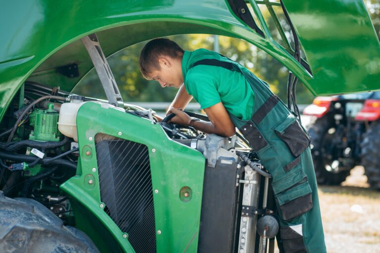 Young,Mechanic,Repair,Tractor,Outdoor