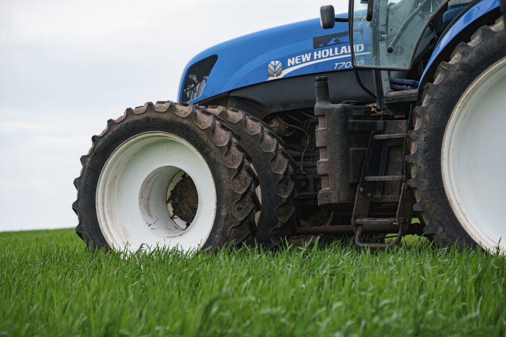 New,Holland,T7060,Tractor,Working,With,Blu jet,At3015,Applicator,On